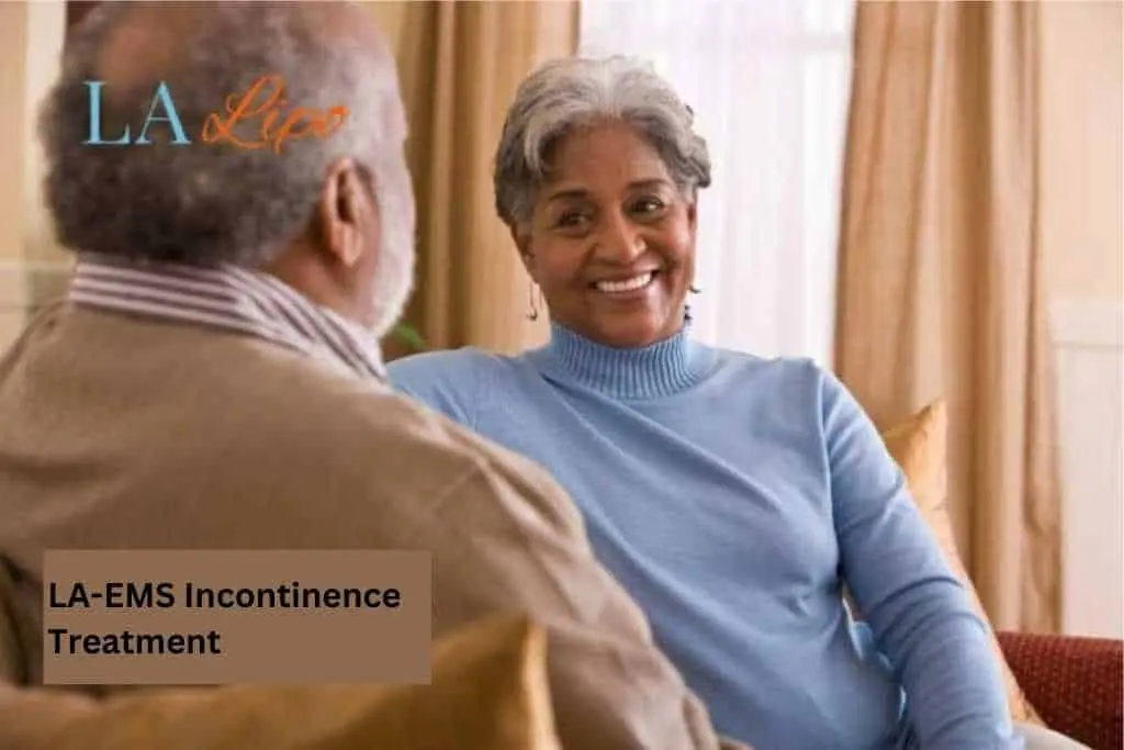 Couple sat smiling at each other - LA-EMS treatment Congleton
